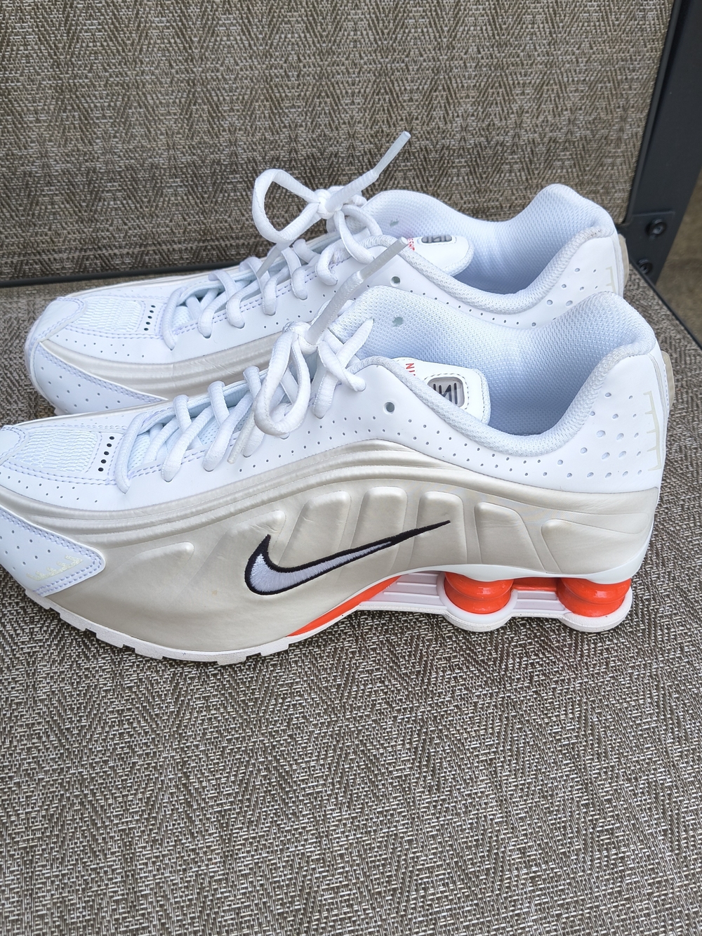 Nike White/Beige Shox Sneakers with Orange Accents